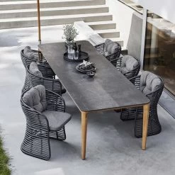 Cane-line - Basket Outdoor Fauteuil 9 Cane-line - Basket Outdoor Fauteuil -Meubilair Verkoopwinkel Cane line Basket Outdoor Sessel Ambiente 2