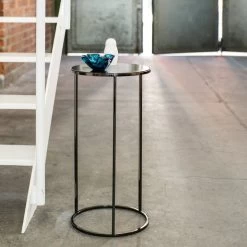 Schönbuch - Rack Paraplubak & Bijzettafel -Meubilair Verkoopwinkel Schoenbuch Rack Beistelltisch schwarz rund neben Treppe Ambiente